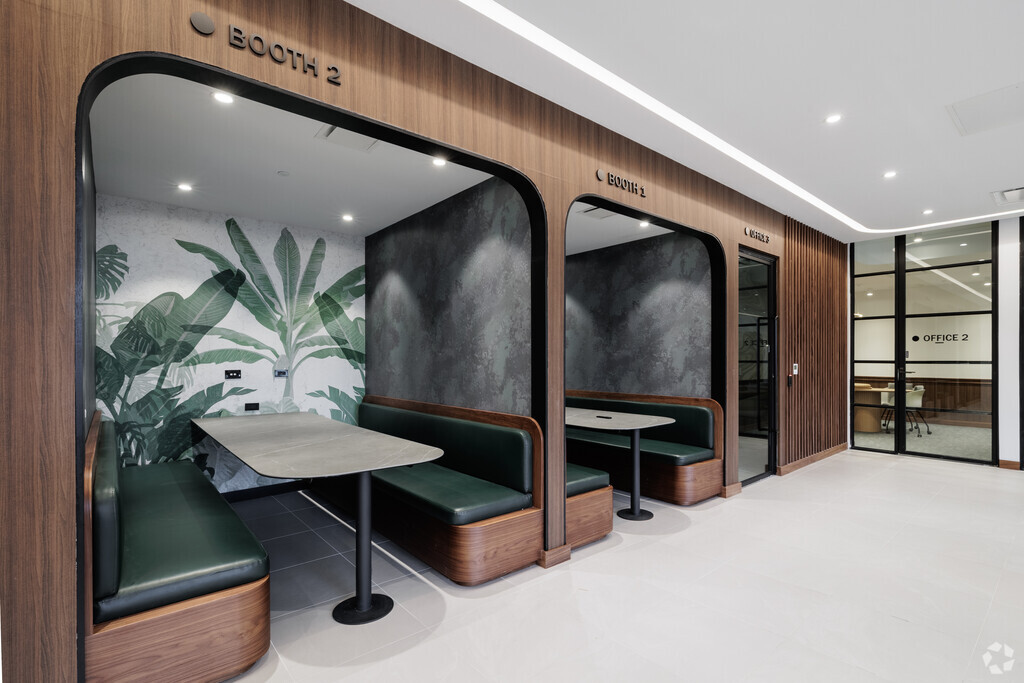 The Forte luxury apartment rentals co-working space in Hackensack, NJ, with modern private work booths for residents.